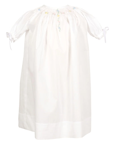 White dress with sheer sleeves on a white background