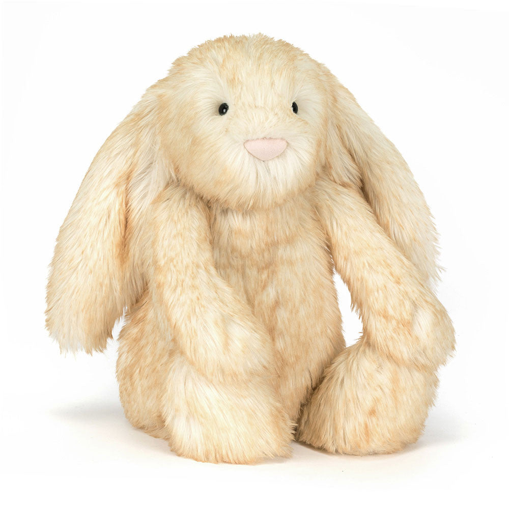 Plush bunny toy on a white background