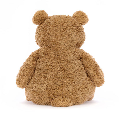 A medium-sized plush toy bear with a brown color and a soft, fluffy texture. It has a round face with a small nose and eyes, and is sitting upright.