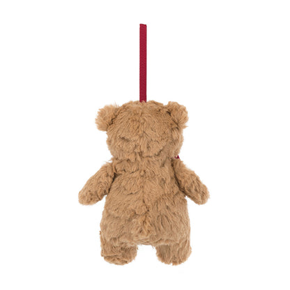 Brown teddy bear with a red ribbon on a white background