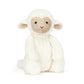 lamb plush toy on a white background