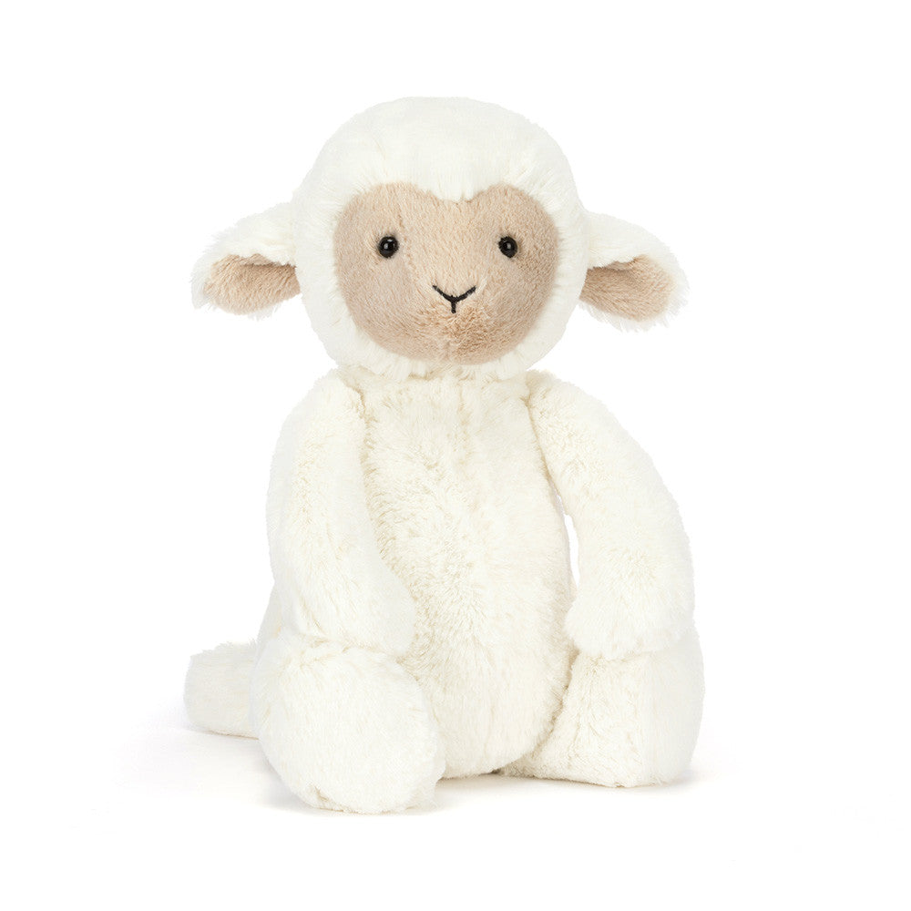 lamb plush toy on a white background
