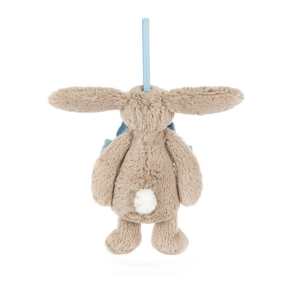Plush bunny toy with a blue tag on a white background