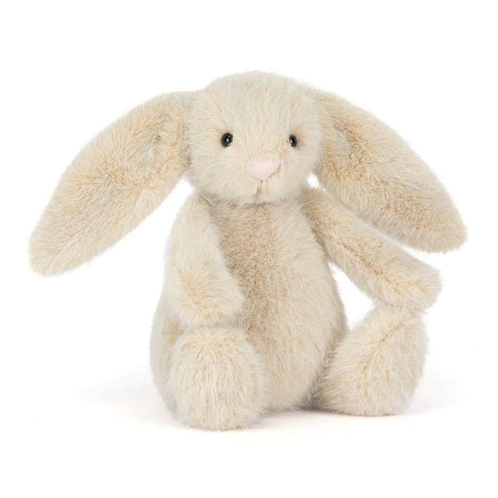 Fluffy beige bunny plush toy on a white background
