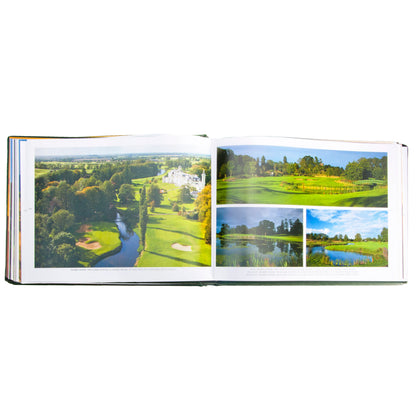 Open book displaying images of a golf course with greenery and water features.