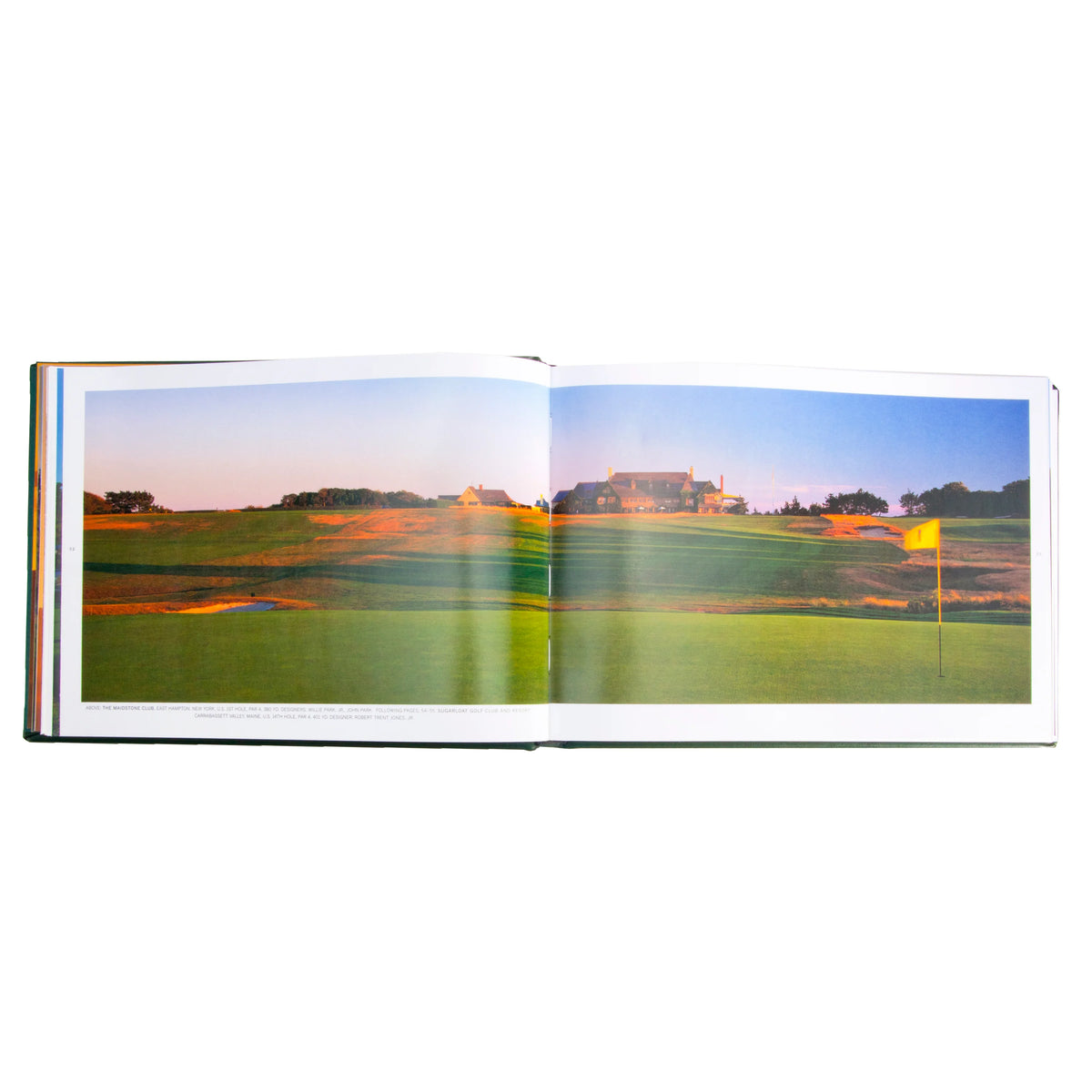 Open book showing a scenic golf course with a sunset.