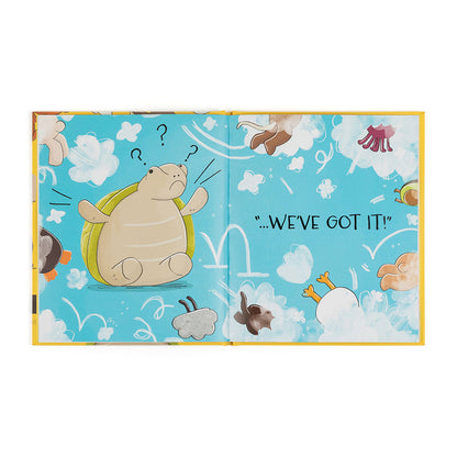 Open book with cartoon turtle and cloud illustrations on a blue background