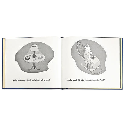 Illustrated book page with a rabbit character and a table, featuring text.