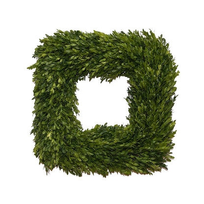 Square artificial boxwood wreath on a white background