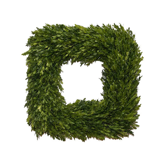 Square artificial boxwood wreath on a white background