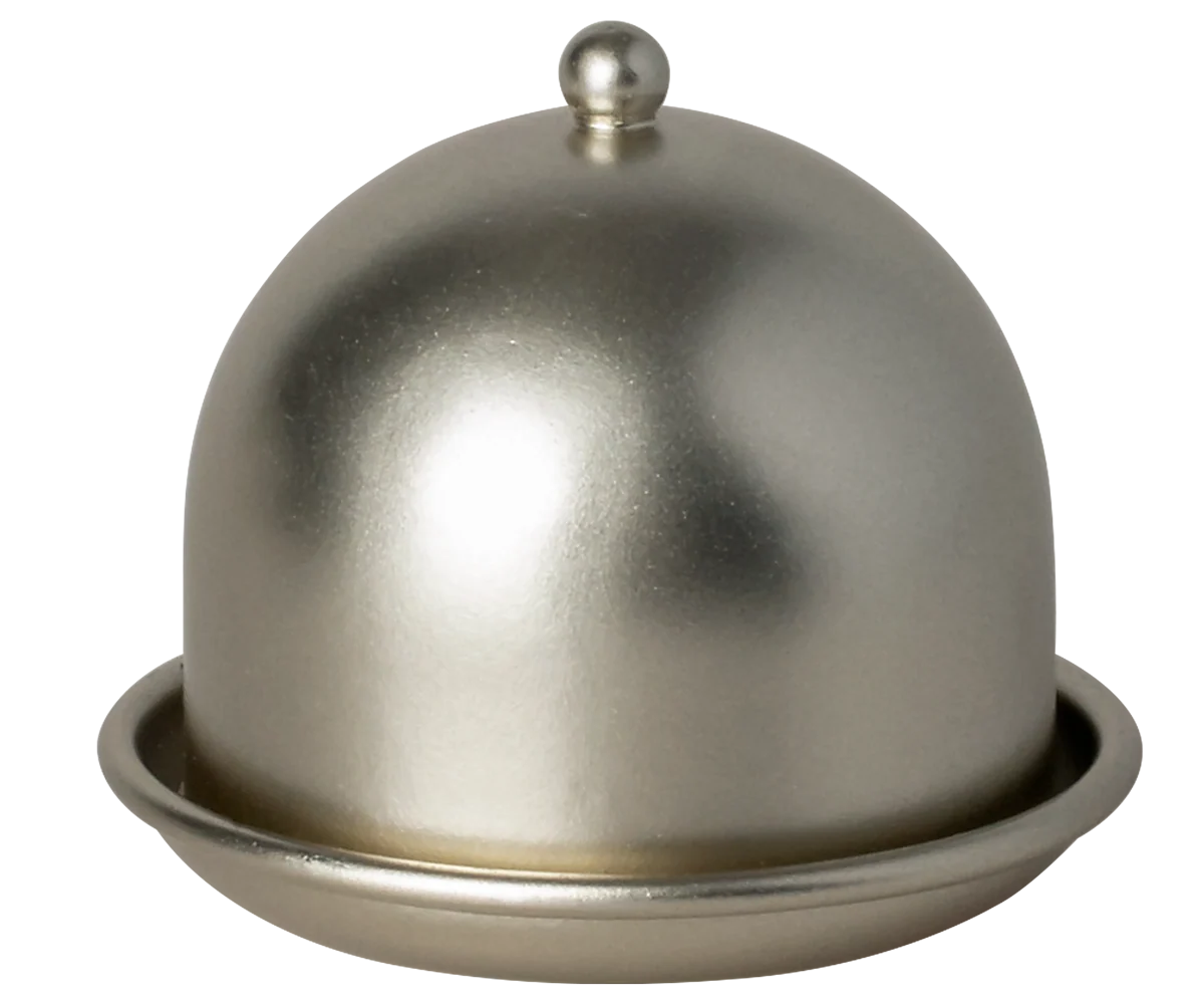 Metallic dome-shaped object on a white background