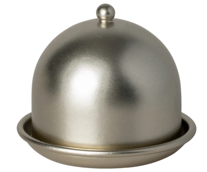 Metallic dome-shaped object on a white background