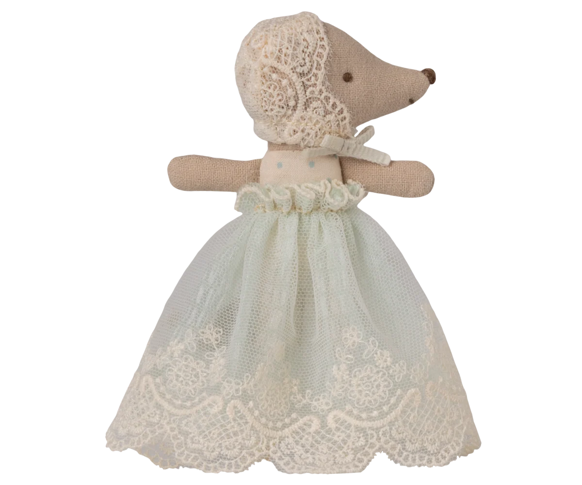 A vintage-style plush mouse doll wearing a cream lace bonnet and a pale green tulle dress with lace trim, isolated on a white background.
