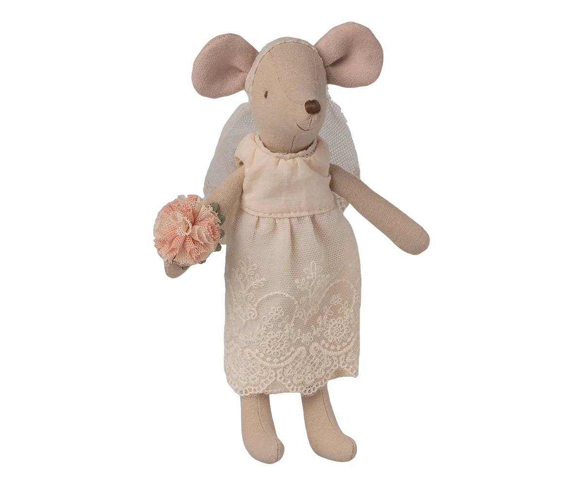 A plush mouse doll wearing a cream-colored dress with lace detailing and holding a small pink flower bouquet, isolated on a white background.