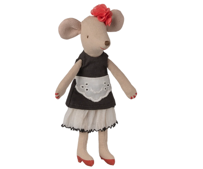 A plush mouse doll dressed in a dark brown apron top, white skirt, and red shoes, with a red flower in its ears, shown against a plain white background.