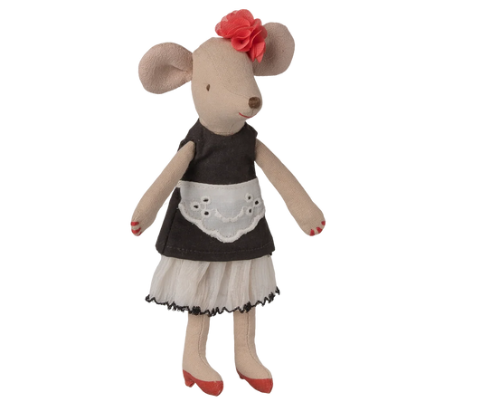 A plush mouse doll dressed in a dark brown apron top, white skirt, and red shoes, with a red flower in its ears, shown against a plain white background.