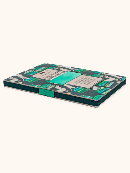 Notebook with a green and blue design on a white background