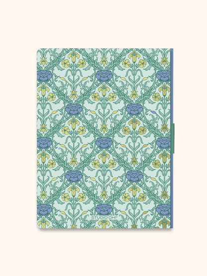 A hardcover notebook featuring a classic William Morris-style floral pattern in mint green, lavender, and yellow. The cover has a small 'STUDIO 452' printed at the bottom center.