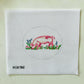 Cross-stitched design of a pig on a white fabric canvas with a circular border.