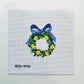 Cross-stitched wreath with blue ribbon on a white background
