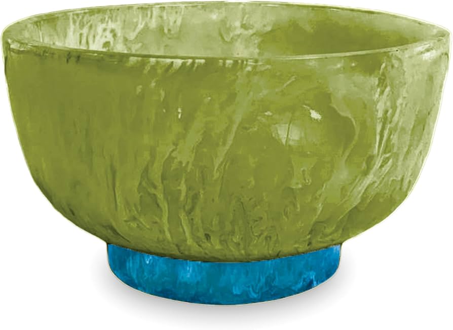 Green textured bowl with a blue base on a white background