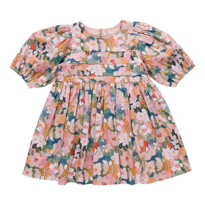 Floral dress with puff sleeves on a white background