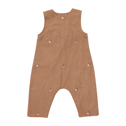 Brown sleeveless baby romper with button details on a white background