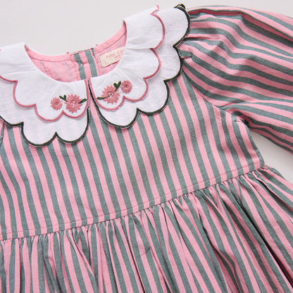Pink and gray striped dress with floral embroidery on a white background