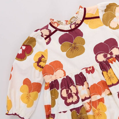 Floral-patterned dress with colorful flowers on a white background