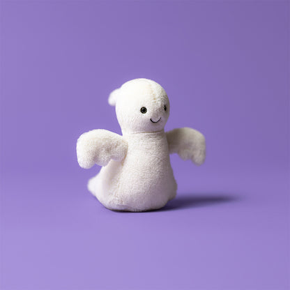 White plush ghost toy on a purple background