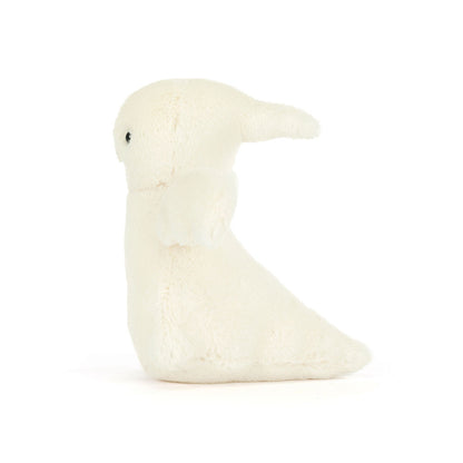 White plush toy resembling a bird on a white background