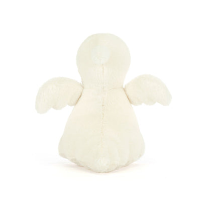 White plush duck toy on a white background