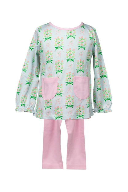 Children's outfit with floral-patterned top and pink pants on a white background