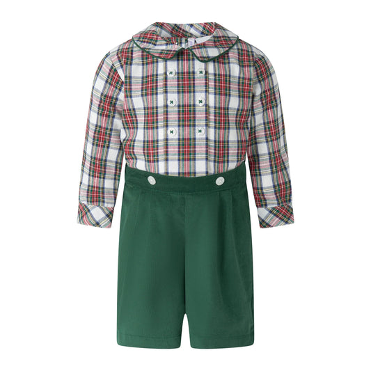 Children's outfit with plaid shirt and green shorts on a white background