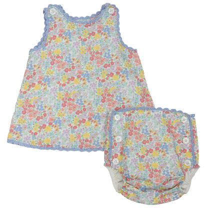 Floral baby dress and bloomers set on a white background