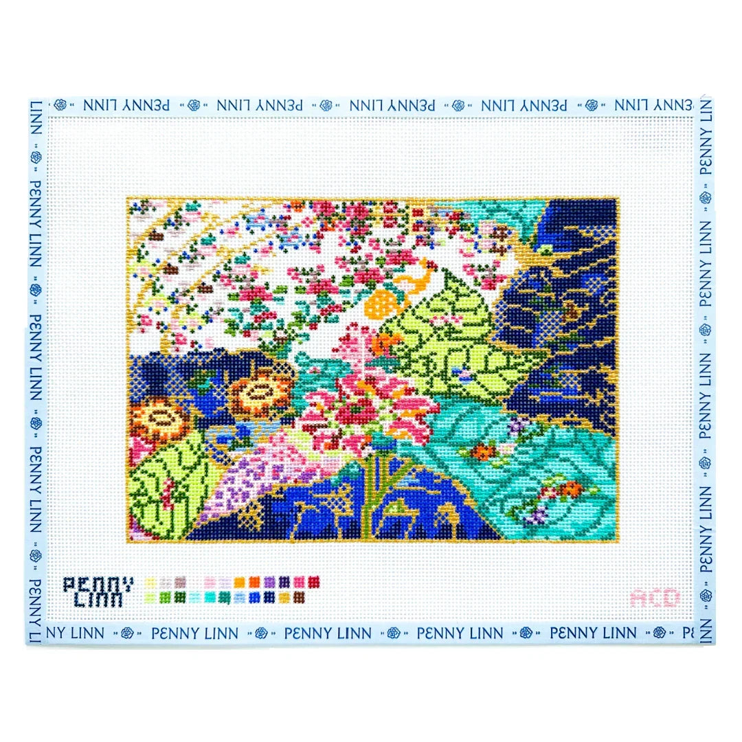 A Penny Linn needlepoint canvas featuring a colorful floral and leafy design, with a white grid border printed with the brand name and a color palette strip at the bottom left.