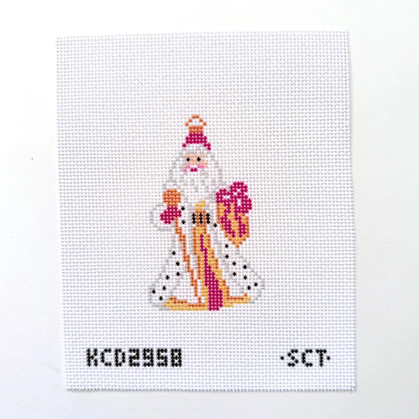 Cross-stitched design of a Santa Claus figure on a white background