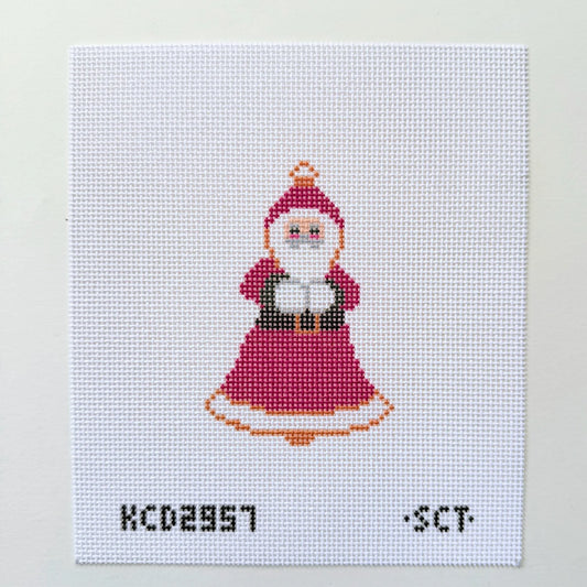 Cross-stitched pattern of a character in a red dress with a white background
