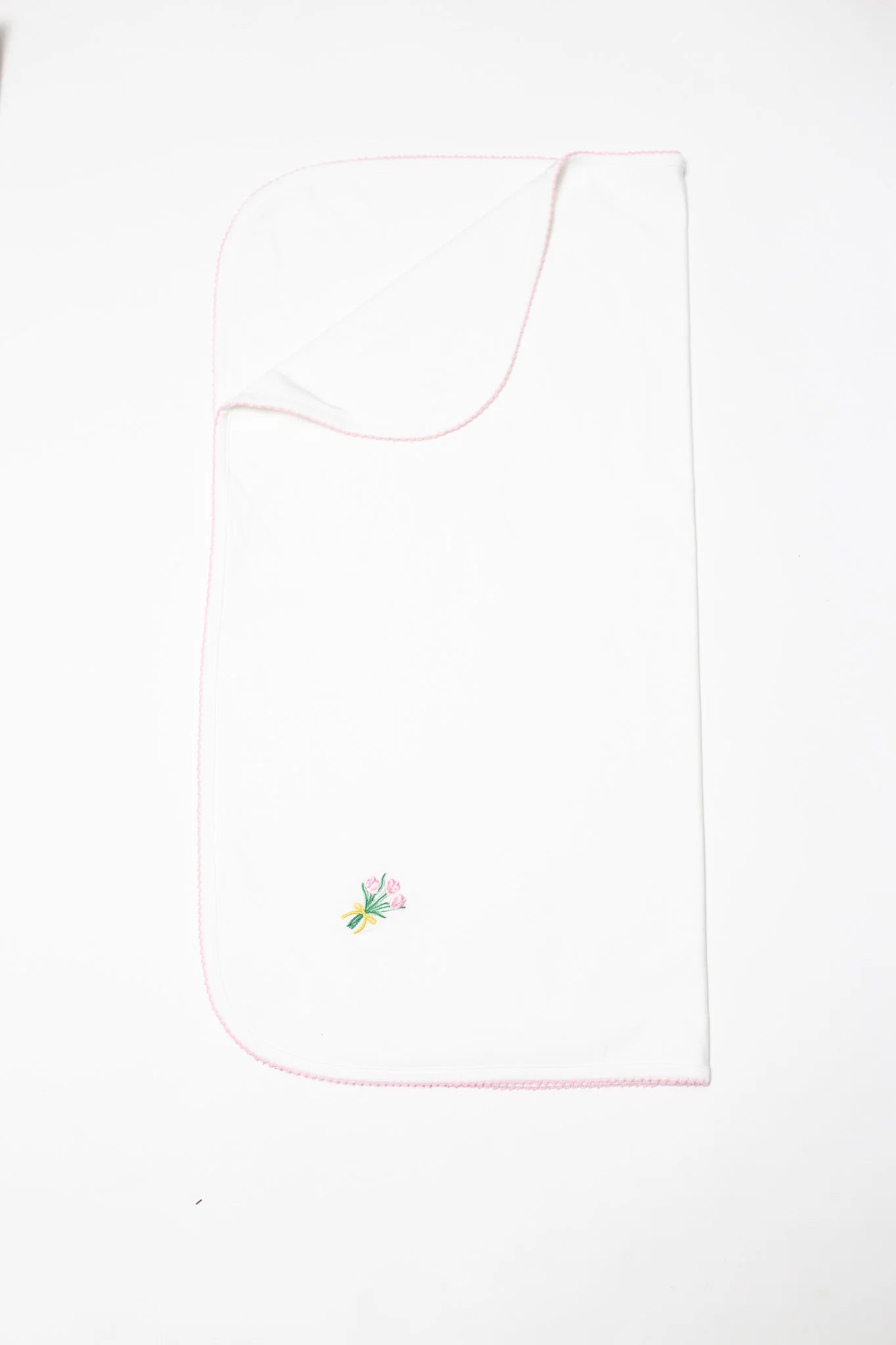 White pocket square with a floral embroidery on a white background