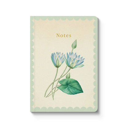 Notebook with floral design and 'Notes' text on a beige background