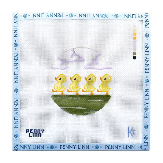 A Penny Linn needlepoint canvas featuring four yellow ducklings walking on a green hill under a light purple sky, surrounded by a blue border printed with the brand name 'PENNY LINN'.