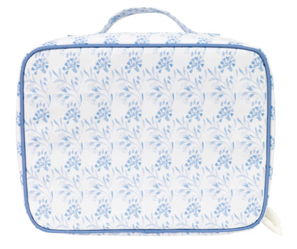 Floral-patterned suitcase with blue flowers on a white background