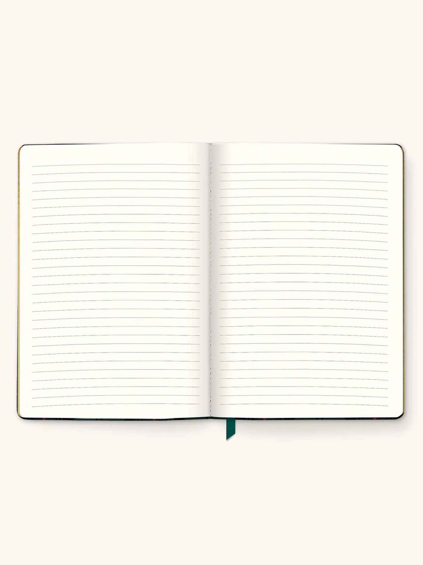 An open lined notebook with blank pages, shown from above on a plain light beige background. A small dark green ribbon bookmark is visible at the bottom center.
