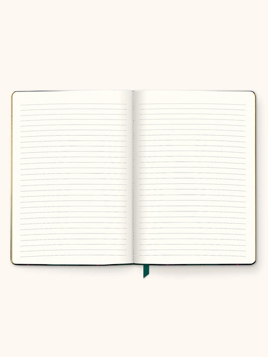 An open lined notebook with blank pages, shown from above on a plain light beige background. A small dark green ribbon bookmark is visible at the bottom center.