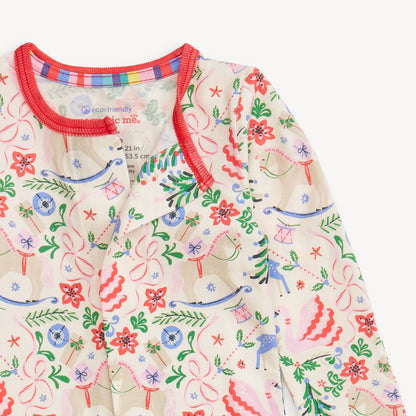 Children's outfit with colorful floral and animal pattern on a white background