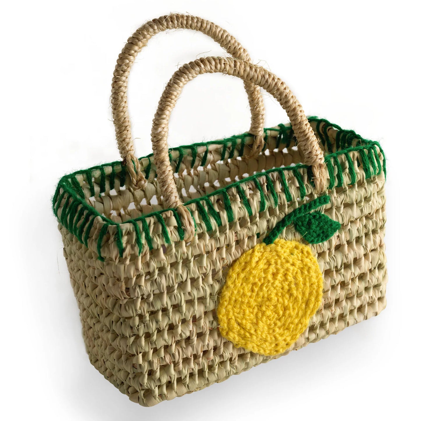 Woven handbag with a yellow lemon design on a white background