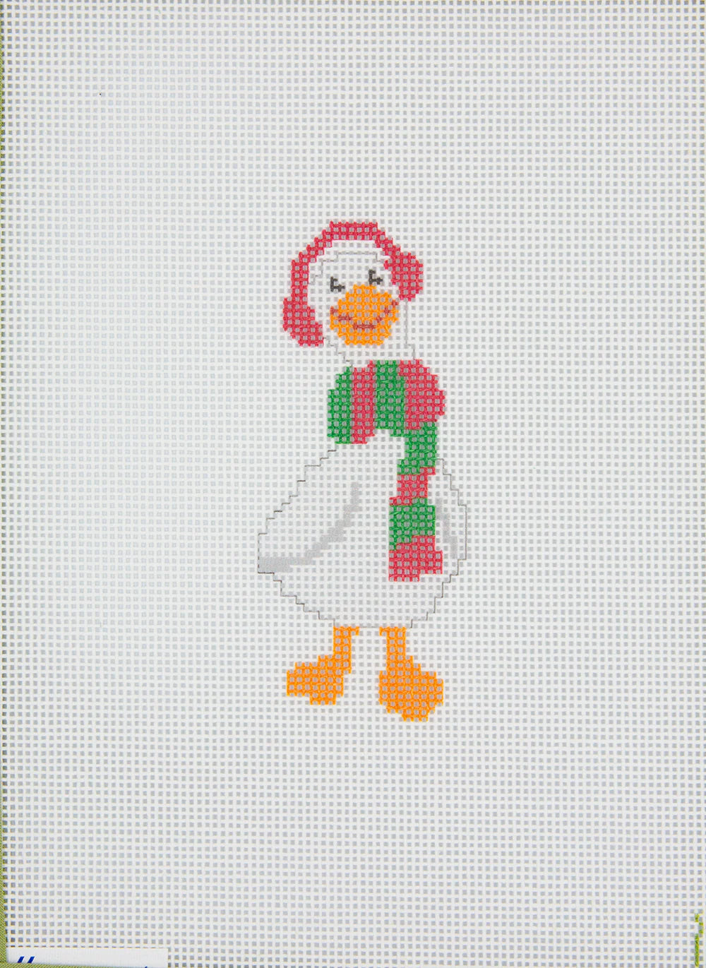 Cross-stitched duck design on a white fabric background
