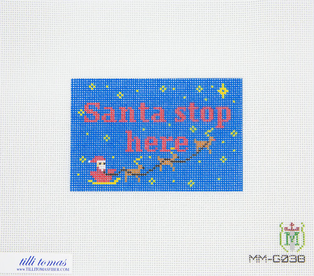 Cross-stitch pattern with 'Santa stop here' text and reindeer on a blue background