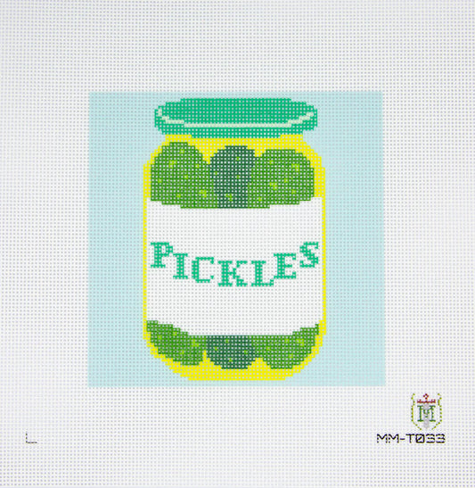 Cross-stitched design of a jar labeled 'Pickles' on a light blue background