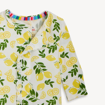 Baby onesie with lemon pattern on a white background
